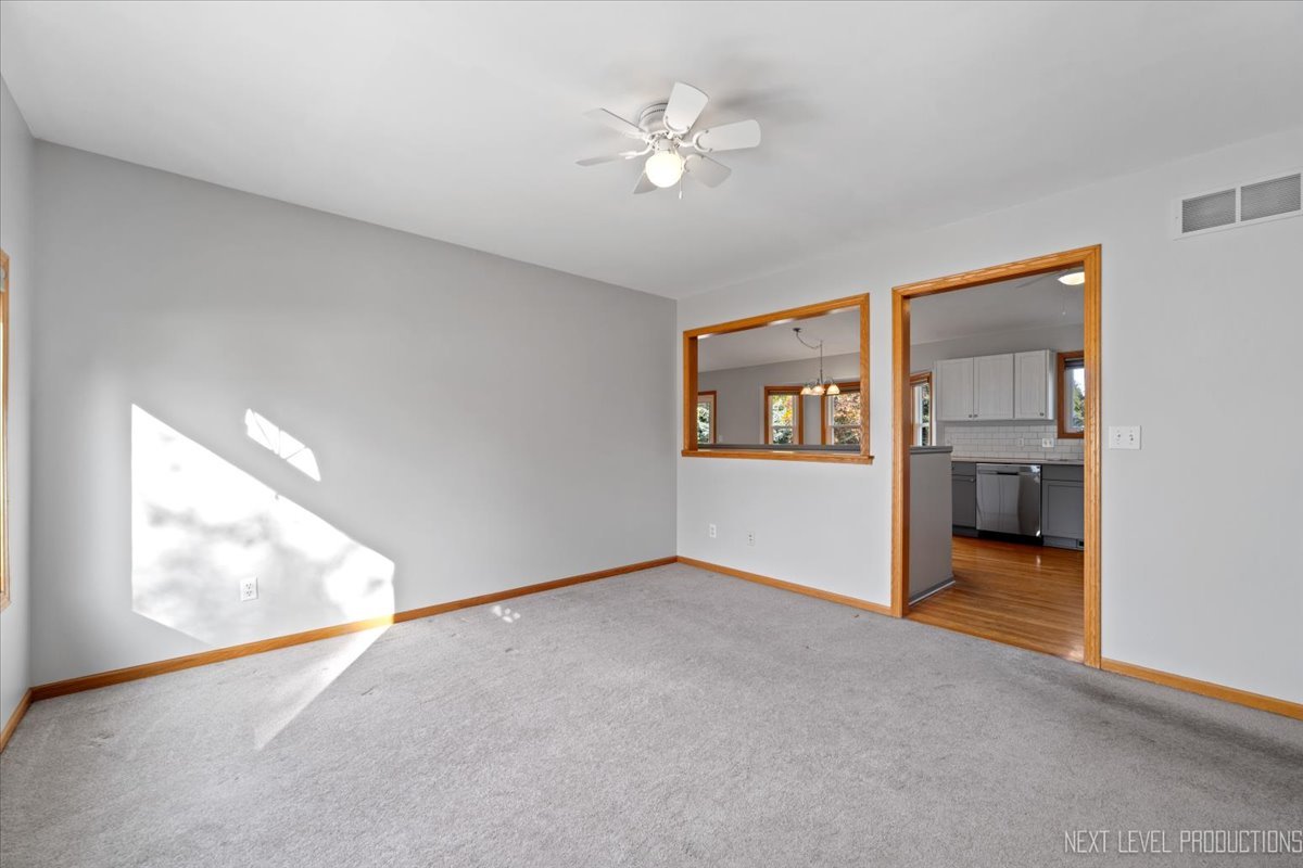 1146 Quail Run DeKalb, IL 60115 - Photo 5 of 31 a view of an empty room with a window