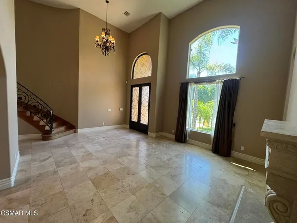 a view of a livingroom with a staircase