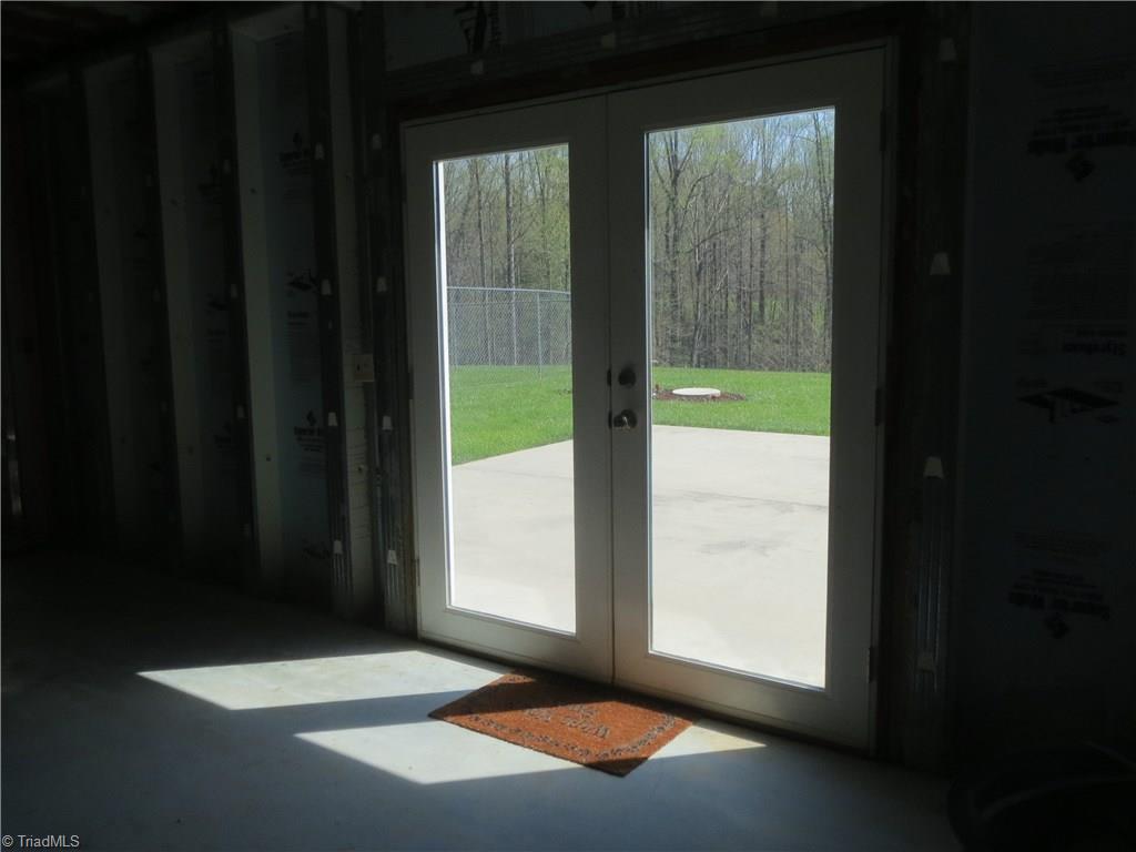 2212 Little Elkin Church Road Ronda, NC 28670 - Photo 28 of 30 View of French doors leading from basement to patio and back yard.