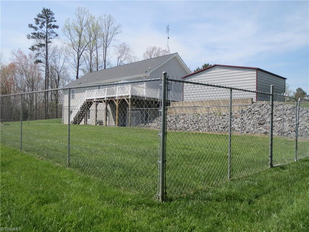 2212 Little Elkin Church Road Ronda, NC 28670 - Photo 8 of 30 Large fenced area perfect play area for children and pets.