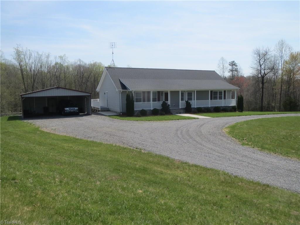 2212 Little Elkin Church Road Ronda, NC 28670 - Photo 10 of 30 Circle drive for ease and convenience. Property also features two-bay carport.