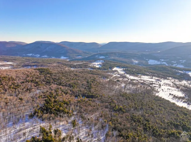 a view of mountain view with mountains in the background