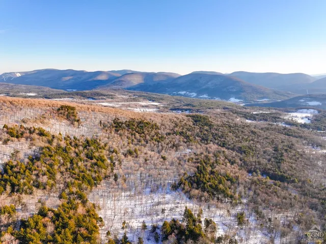 a view of mountains and mountain