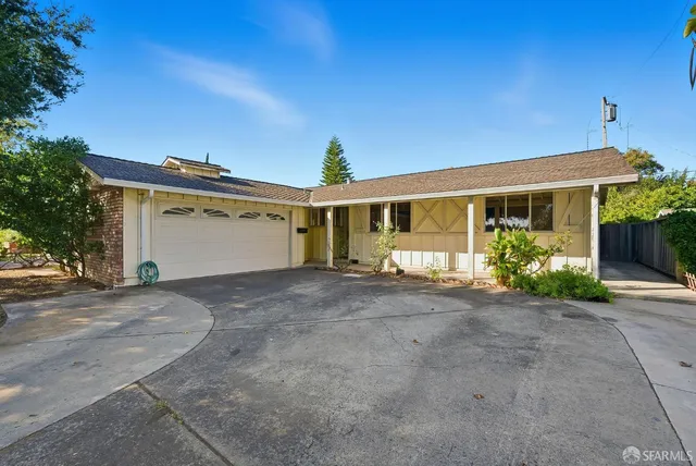 front view of a house with a street