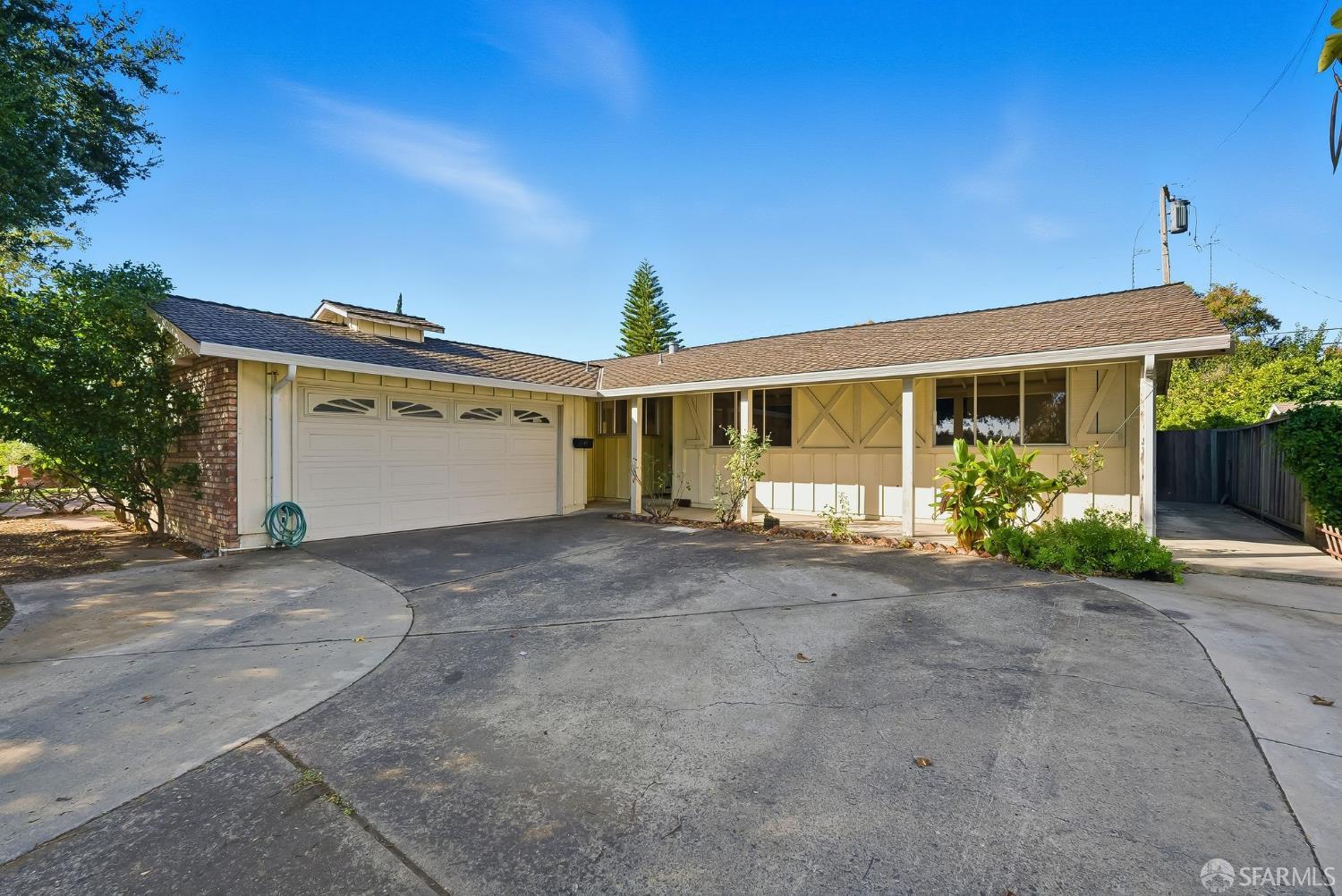 front view of a house with a street
