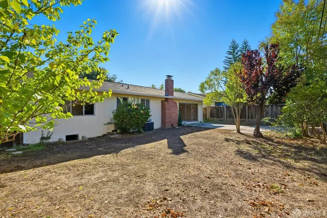 a house with trees in front of it