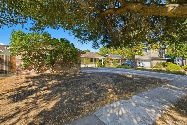 a view of road with houses