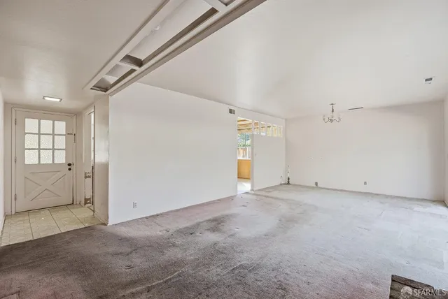 an empty room with windows