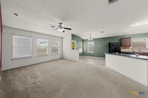 a view of a kitchen with a sink and dishwasher a kitchen view