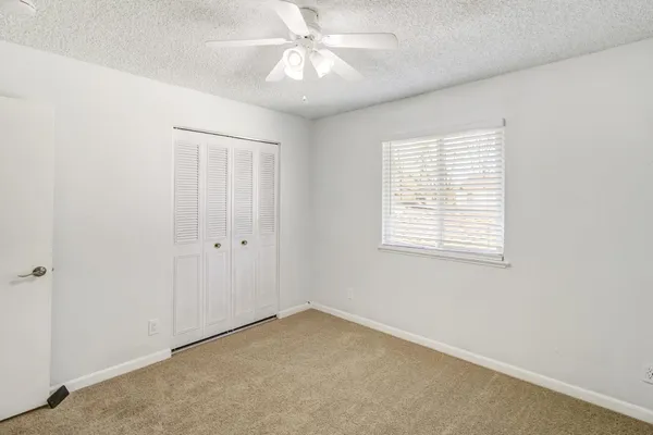 a bathroom with a sink vanity and mirror
