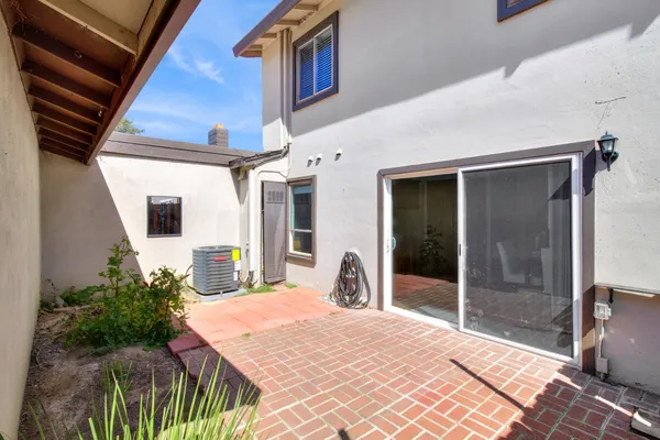 a house with trees in front of it