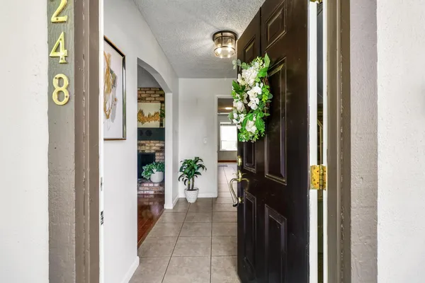 a view of entryway and workspace