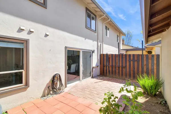 a view of a house with a backyard porch