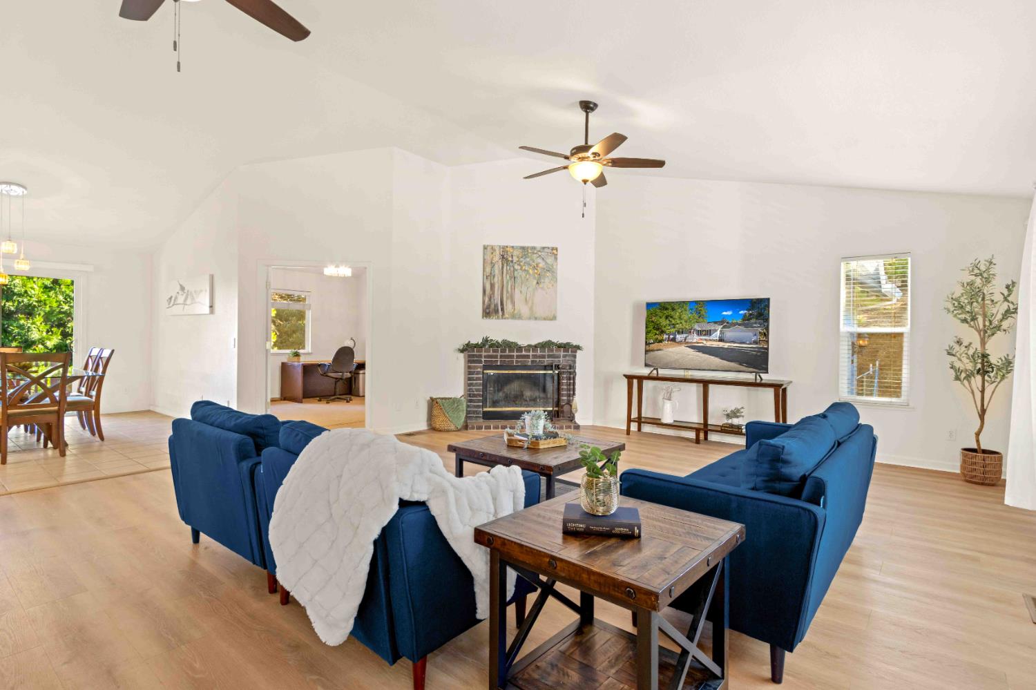5341 Puerta Del Sol Road Camino, CA 95709 - Photo 11 of 31 a living room with furniture and a wooden floor
