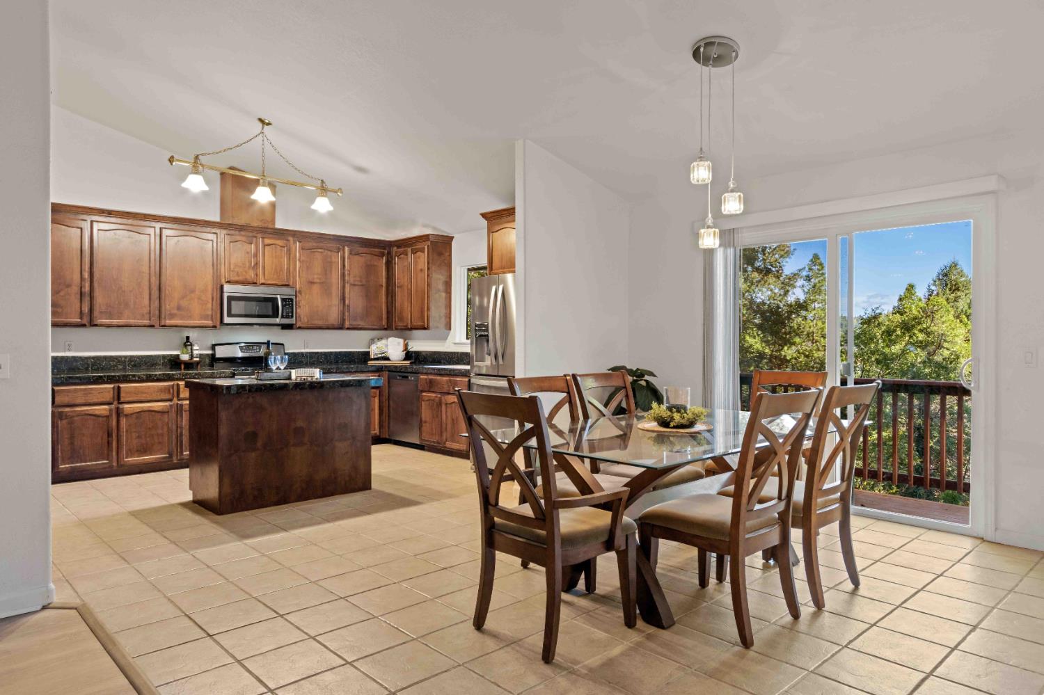 5341 Puerta Del Sol Road Camino, CA 95709 - Photo 5 of 31 a view of a dining room with furniture window and outside view