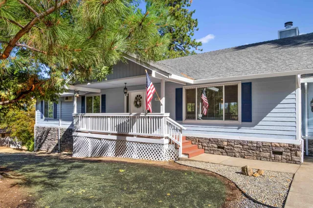 front view of a house with a patio