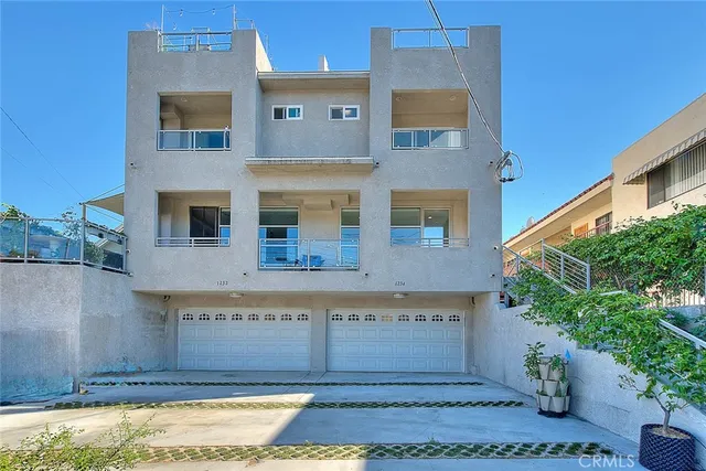 a view of a backyard with sitting area