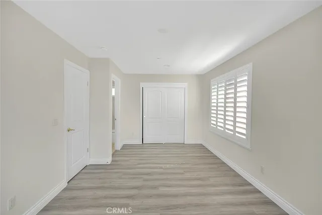 a view of a hallway with staircase