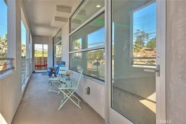 a view of a balcony with an outdoor space
