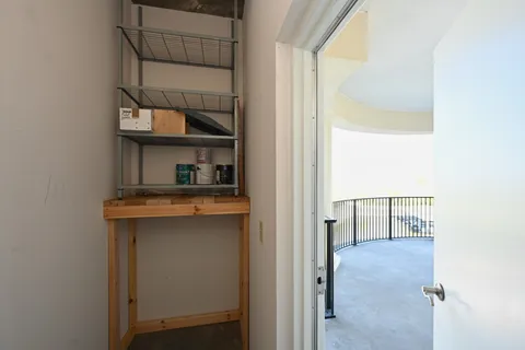 a view of a lake with houses in the background