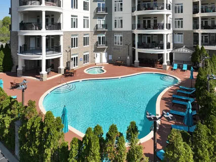 an aerial view of a city with lake view