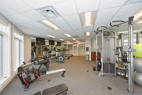 a group of people sitting in a living room