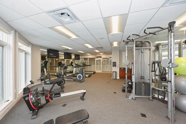 a group of people sitting in a living room