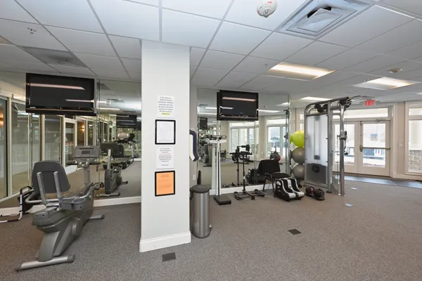 a living room with lots of furniture and lots of furniture