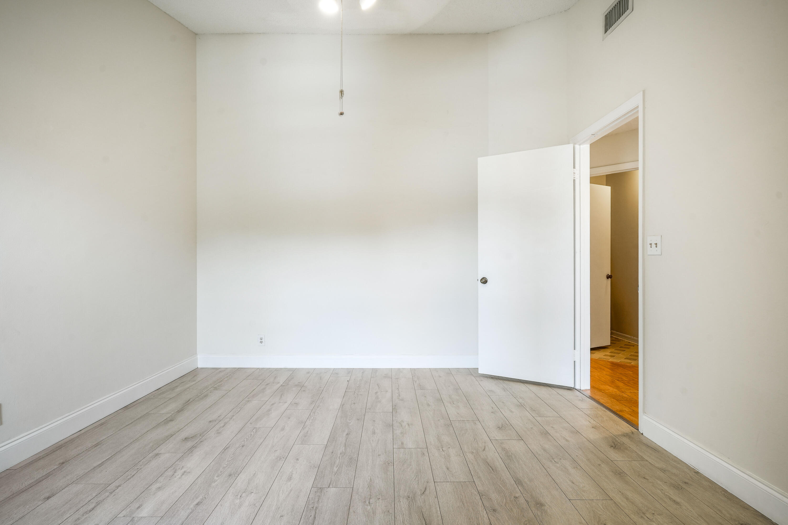 10910 Lakemore Lane, Unit 201 Boca Raton, FL 33498 - Photo 32 of 67 wooden floor in a room