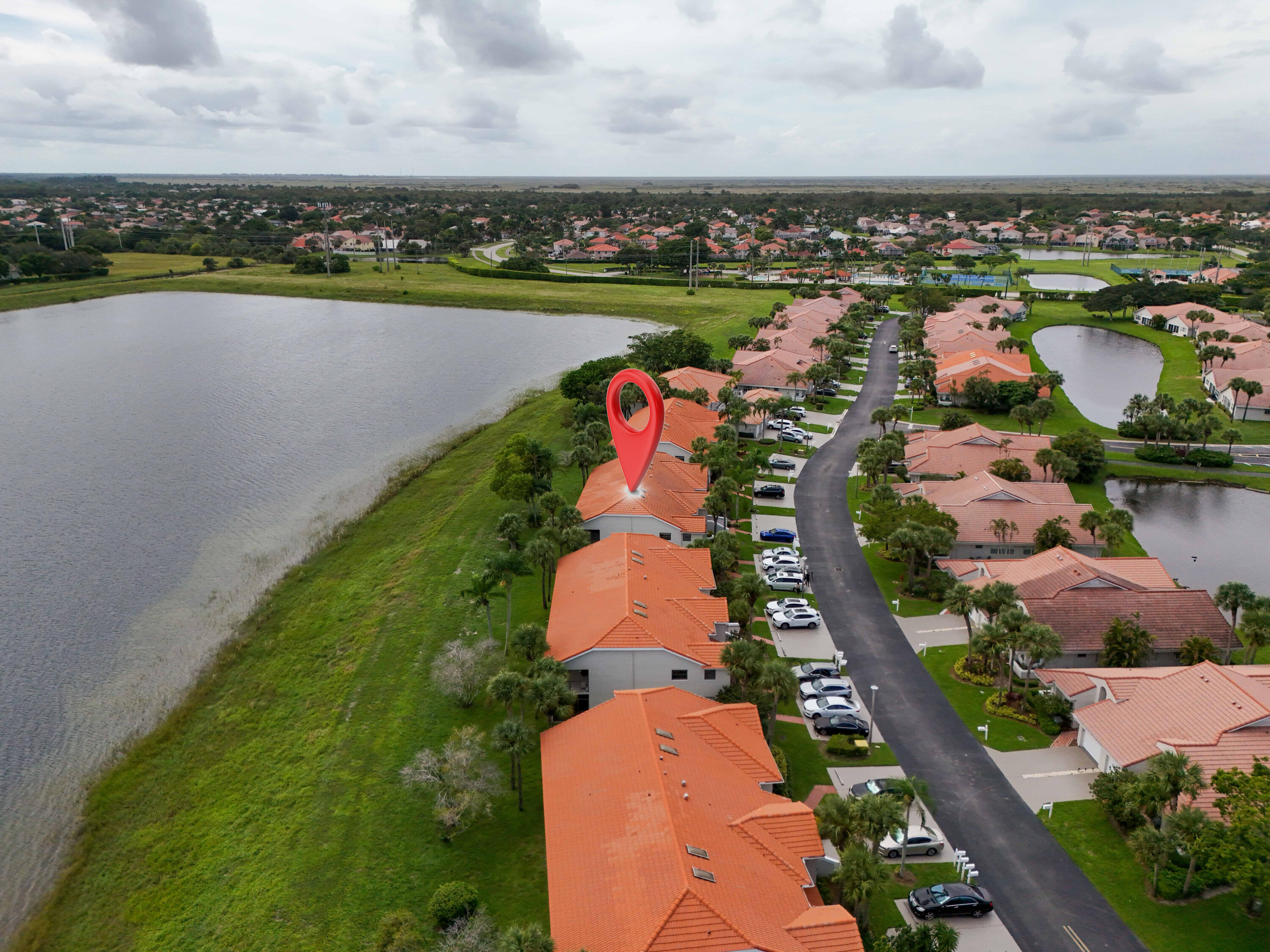10910 Lakemore Lane, Unit 201 Boca Raton, FL 33498 - Photo 49 of 67 an aerial view of a city