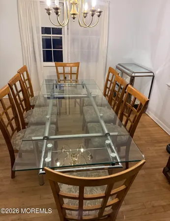 a view of dining room with wooden floor