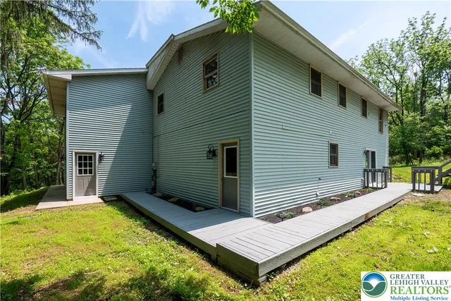 a balcony view with a outdoor seating