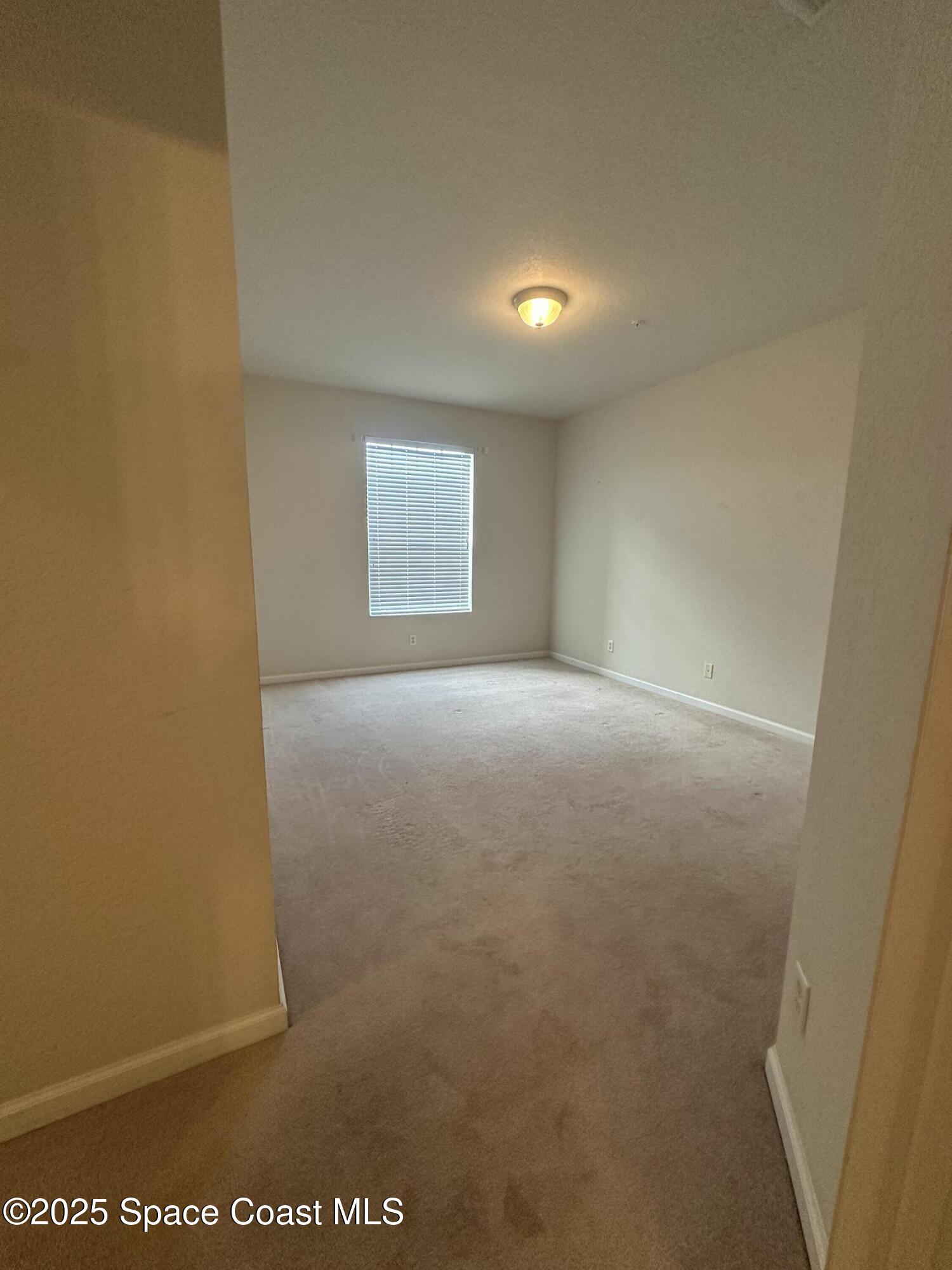 1626 Peregrine Circle, Unit 305 Rockledge, FL 32955 - Photo 12 of 20 a view of room and window