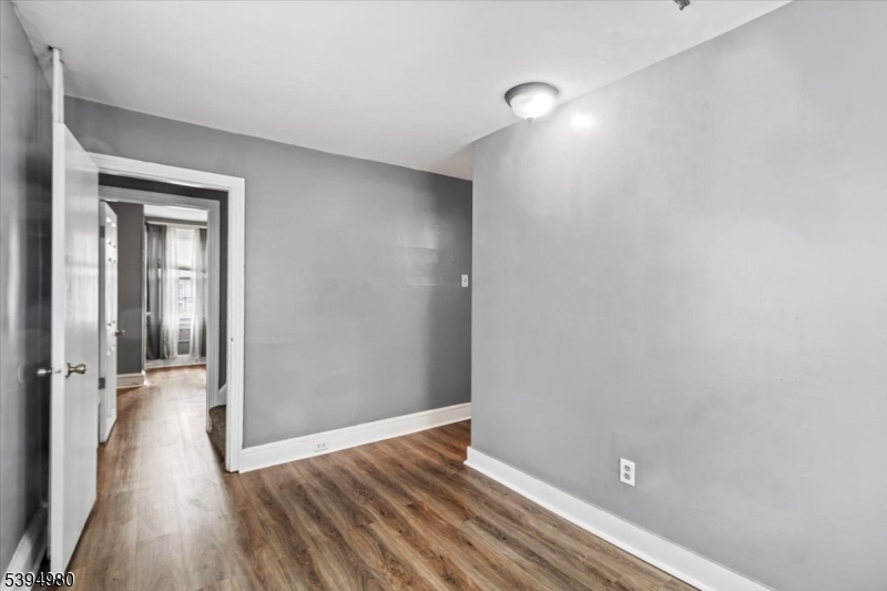 636 Elizabeth Street Beverly, NJ 08010 - Photo 10 of 15 a view of a room with wooden floor