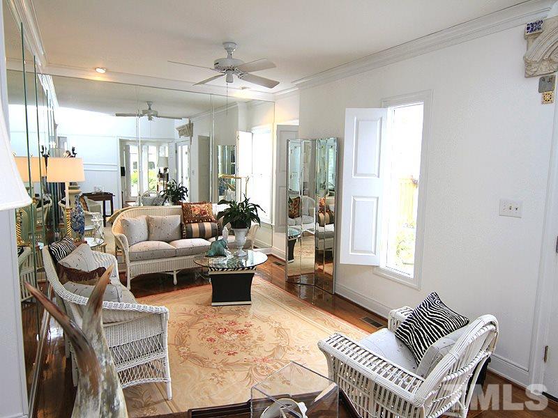 6906 Hunters Way Raleigh, NC 27615 - Photo 11 of 25 a living room with furniture and a window