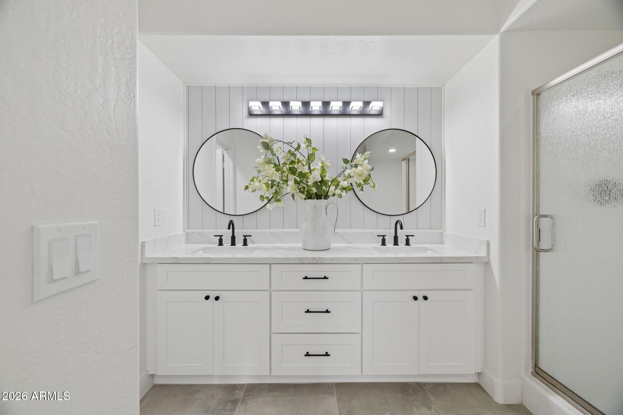 16409 South 33rd Street Phoenix, AZ 85048 - Photo 30 of 61 a bathroom with a double vanity sink and a mirror