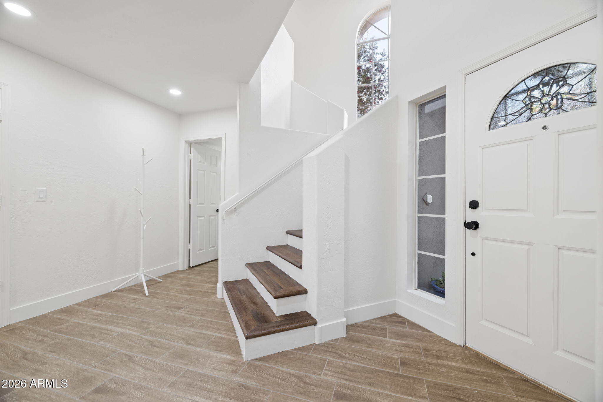 16409 South 33rd Street Phoenix, AZ 85048 - Photo 34 of 61 a view of entryway with stairs and wooden floor