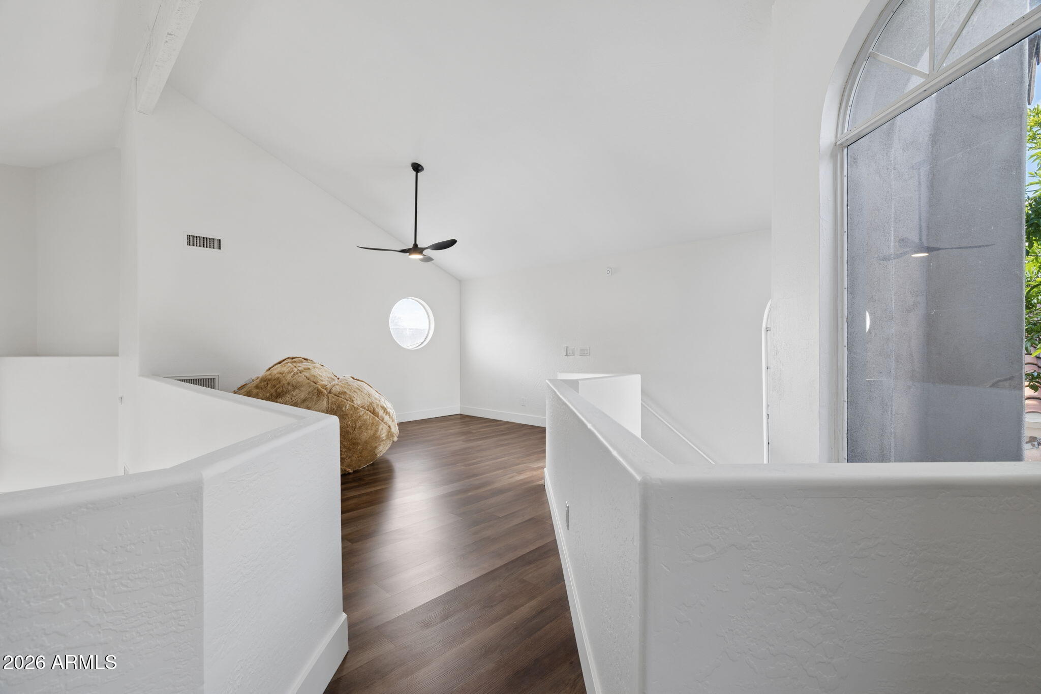 16409 South 33rd Street Phoenix, AZ 85048 - Photo 37 of 61 a view of a room with wooden floor and staircase