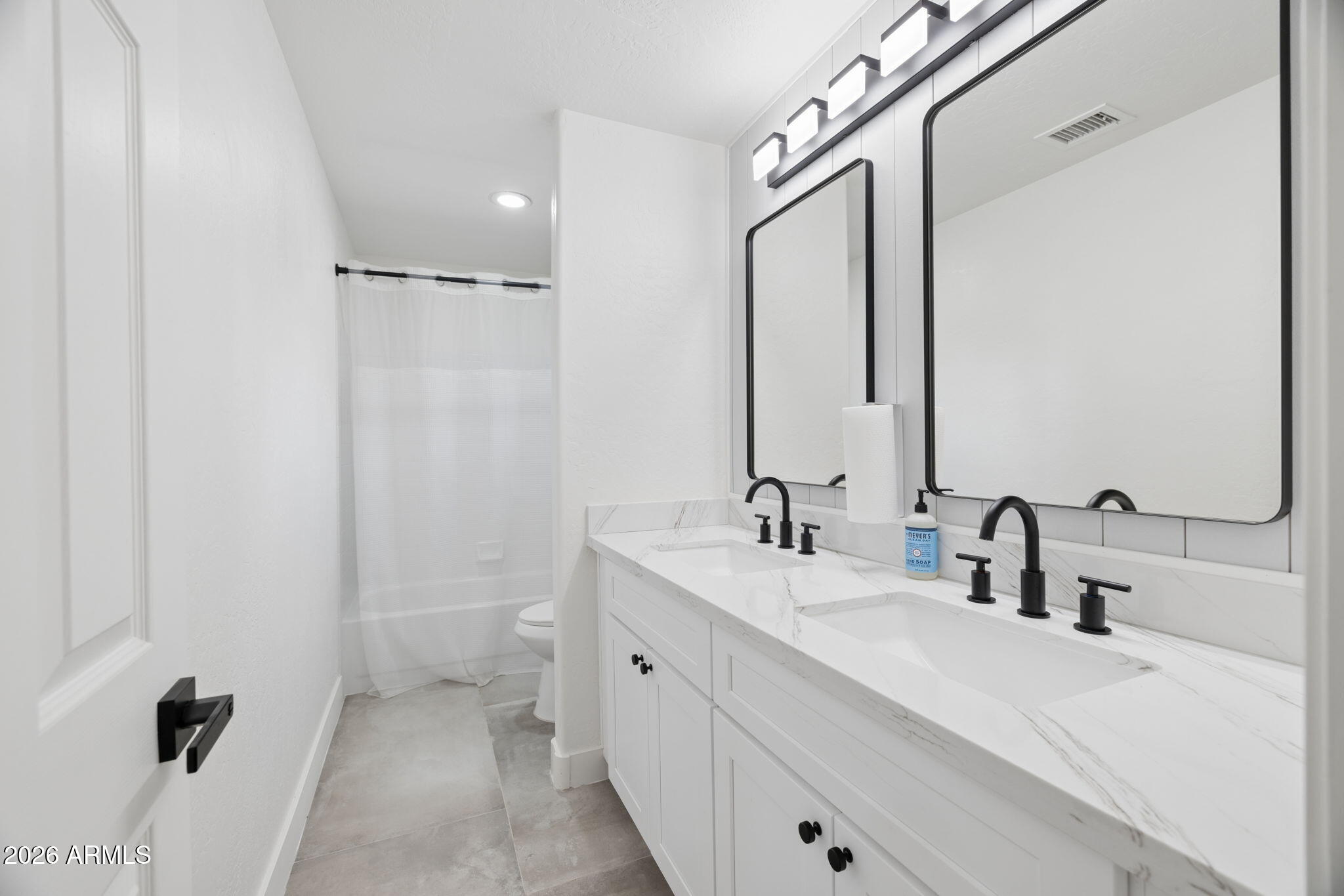 16409 South 33rd Street Phoenix, AZ 85048 - Photo 41 of 61 a bathroom with a double vanity sink mirror and shower