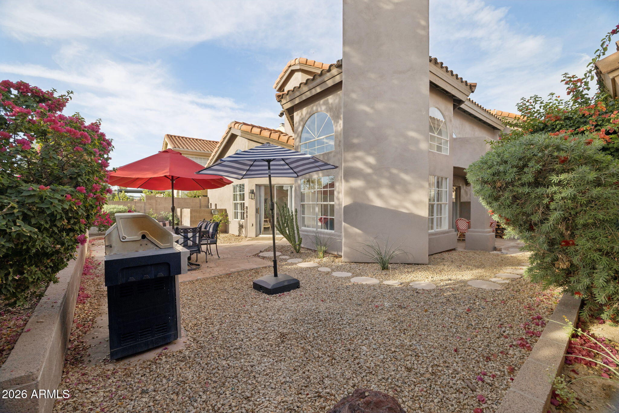 16409 South 33rd Street Phoenix, AZ 85048 - Photo 48 of 61 a view of a chairs and tables in the patio