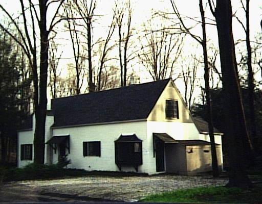 12 Old Mailcoach Road Redding, CT 06896 - Photo 1 of 1 a front view of a house with garden