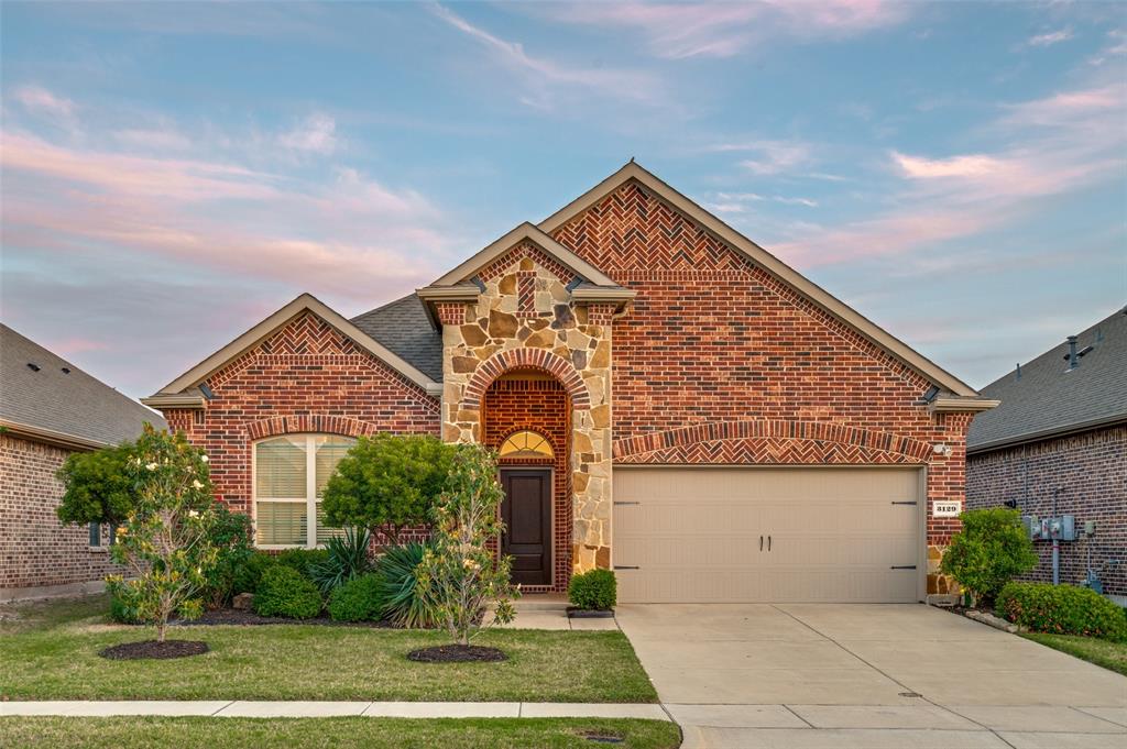 3129 Maverick Drive Forney, TX 75126 - Photo 1 of 1 front view of a house with a yard