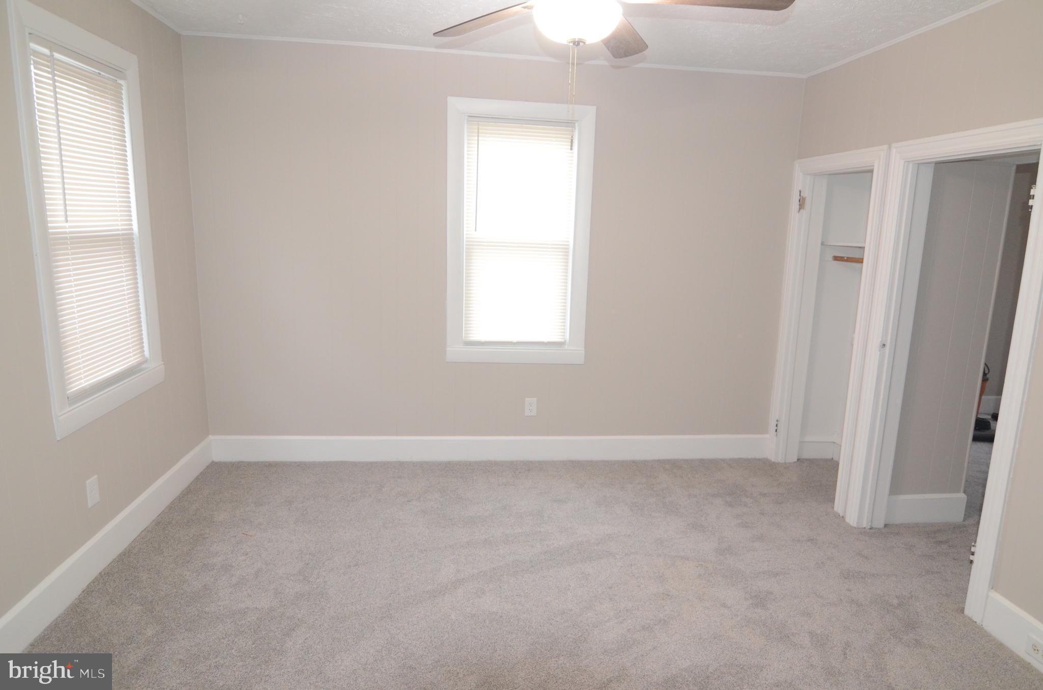 219 9th Avenue, Unit B Haddon Heights, NJ 08035 - Photo 17 of 22 an empty room with windows