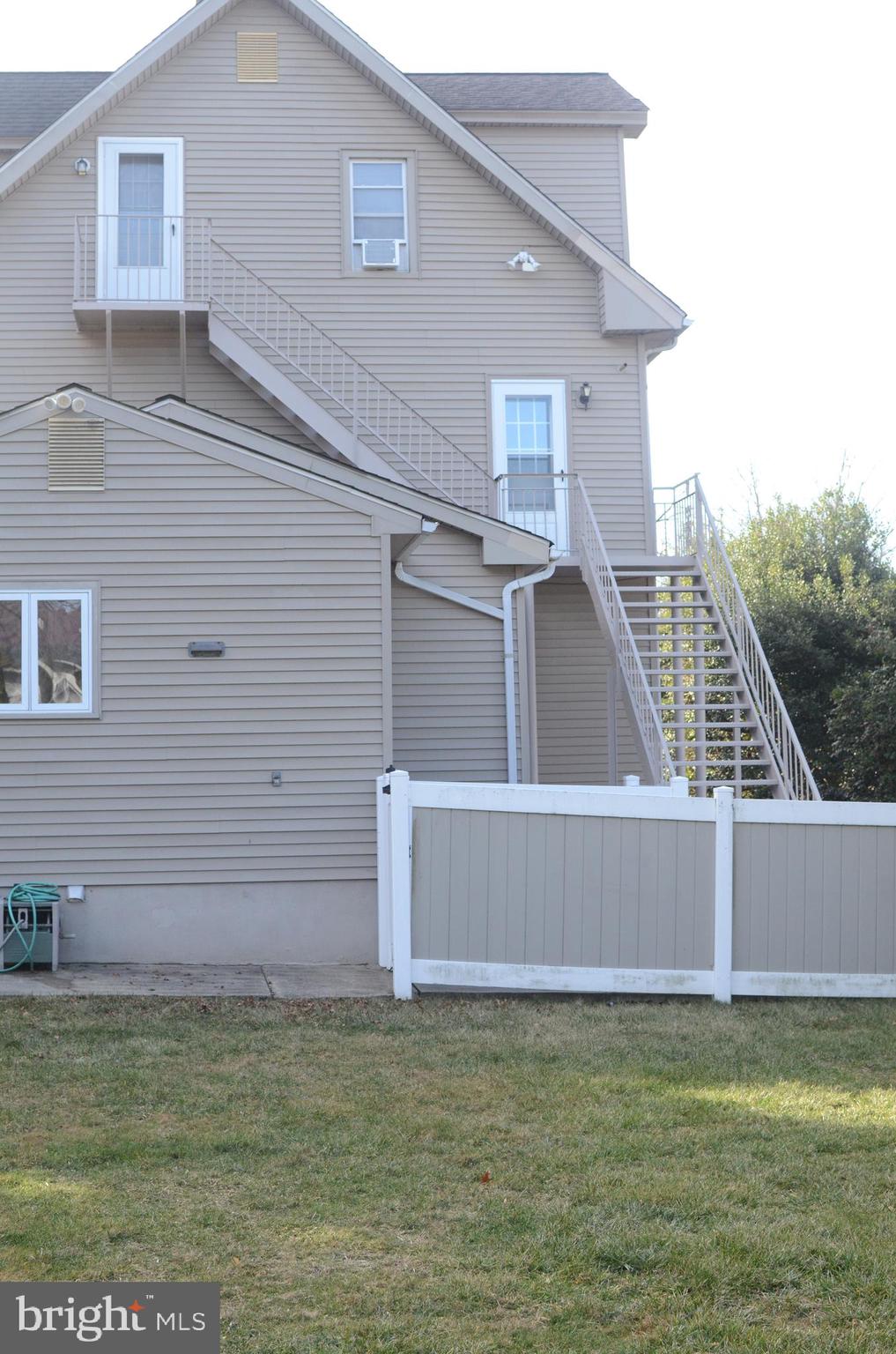 219 9th Avenue, Unit B Haddon Heights, NJ 08035 - Photo 22 of 22 a view of a back yard of the house