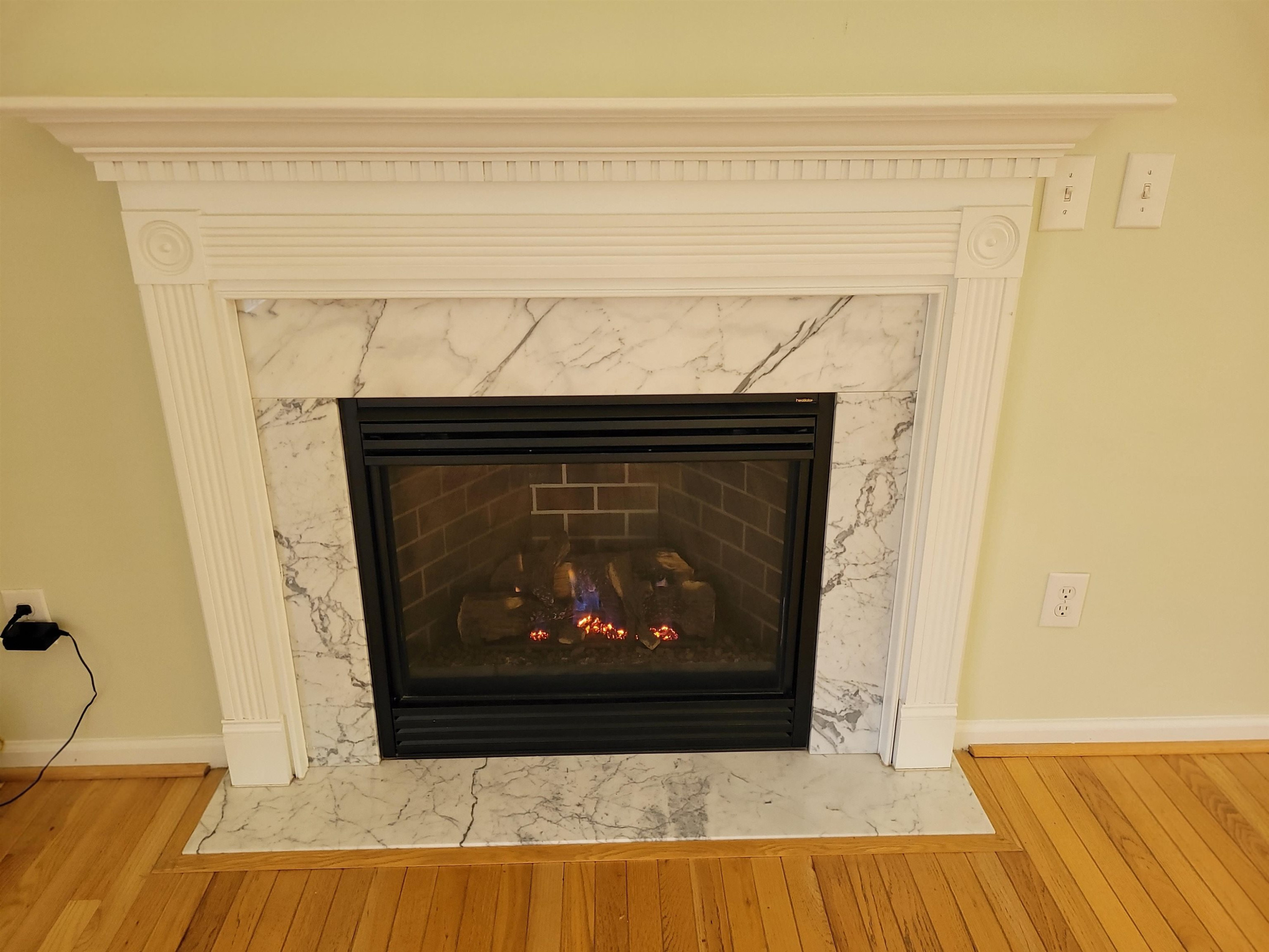 7 Calaveras Court Durham, NC 27713 - Photo 11 of 30 a living room with a fireplace
