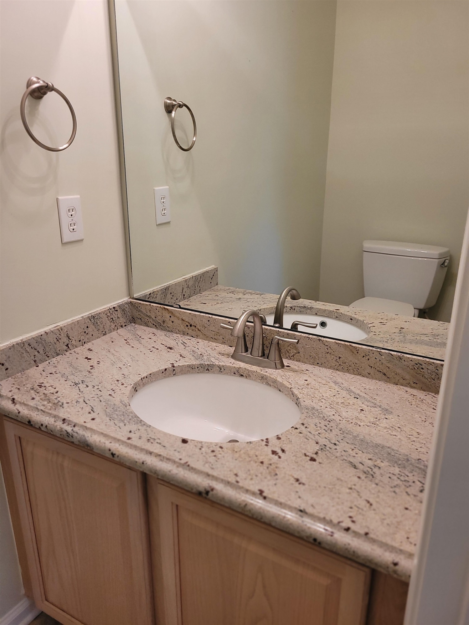 7 Calaveras Court Durham, NC 27713 - Photo 12 of 30 a bathroom with a granite countertop sink and a mirror