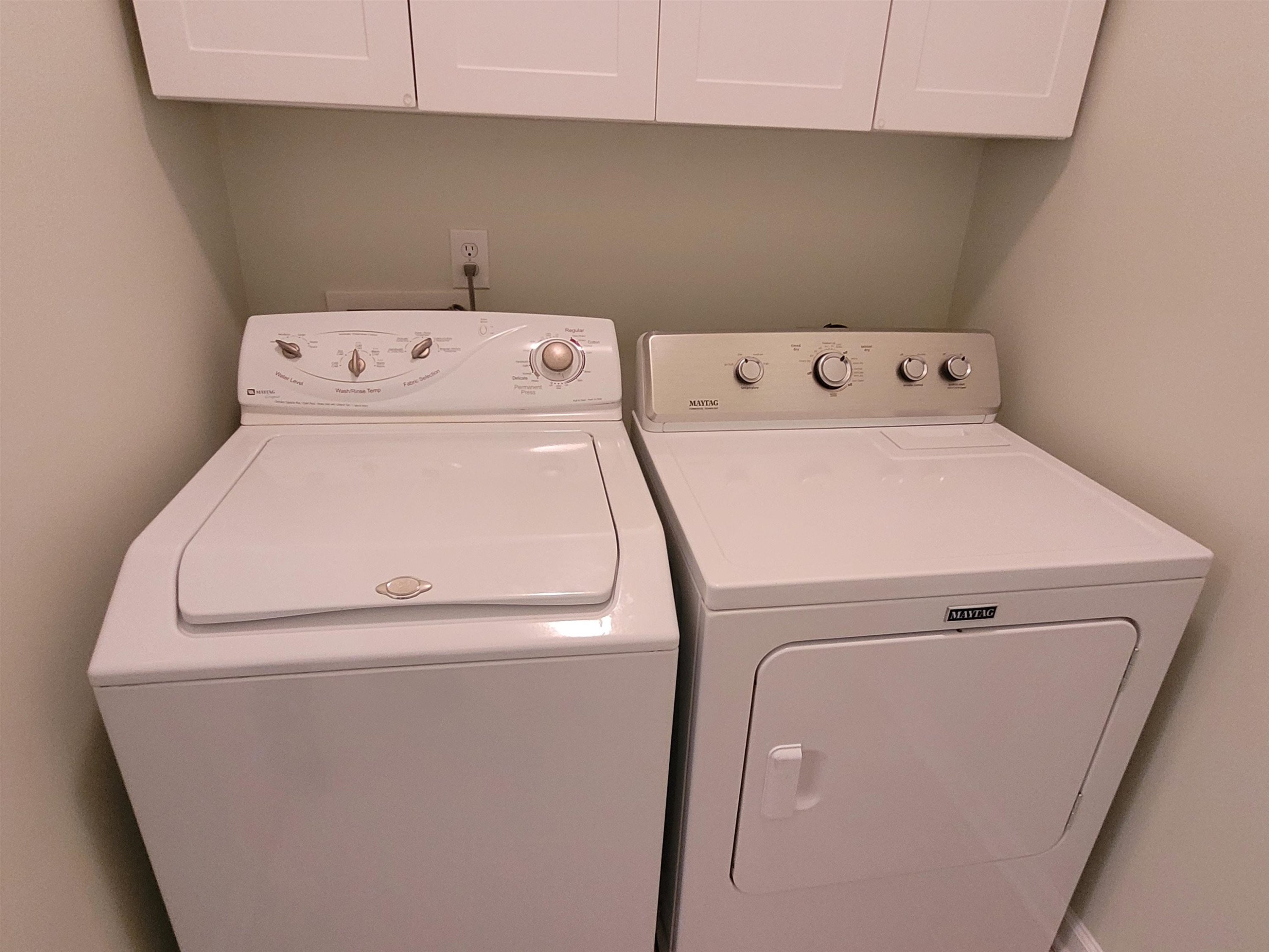 7 Calaveras Court Durham, NC 27713 - Photo 19 of 30 a utility room with dryer and washer