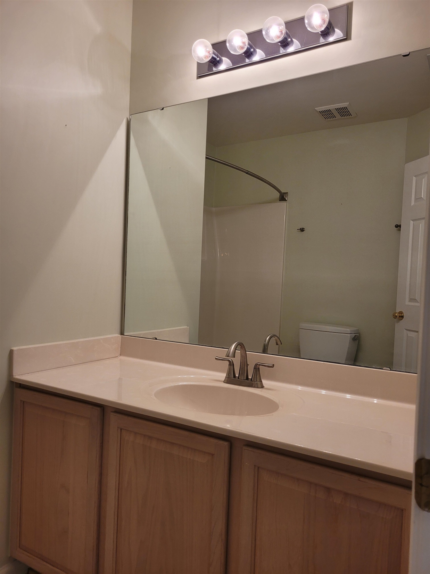 7 Calaveras Court Durham, NC 27713 - Photo 25 of 30 a bathroom with a sink and a mirror