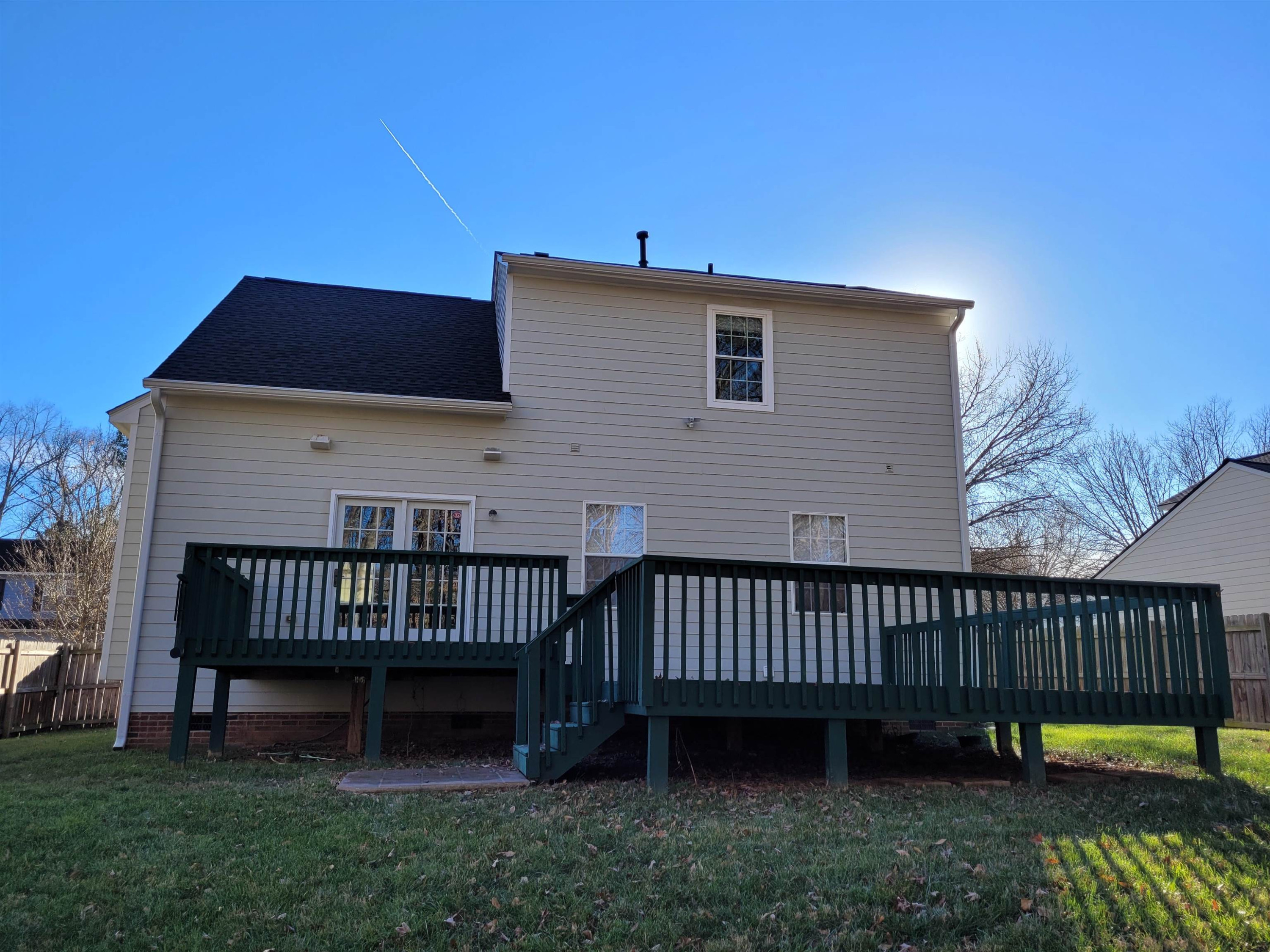 7 Calaveras Court Durham, NC 27713 - Photo 28 of 30 a view of a deck with a chair and swing