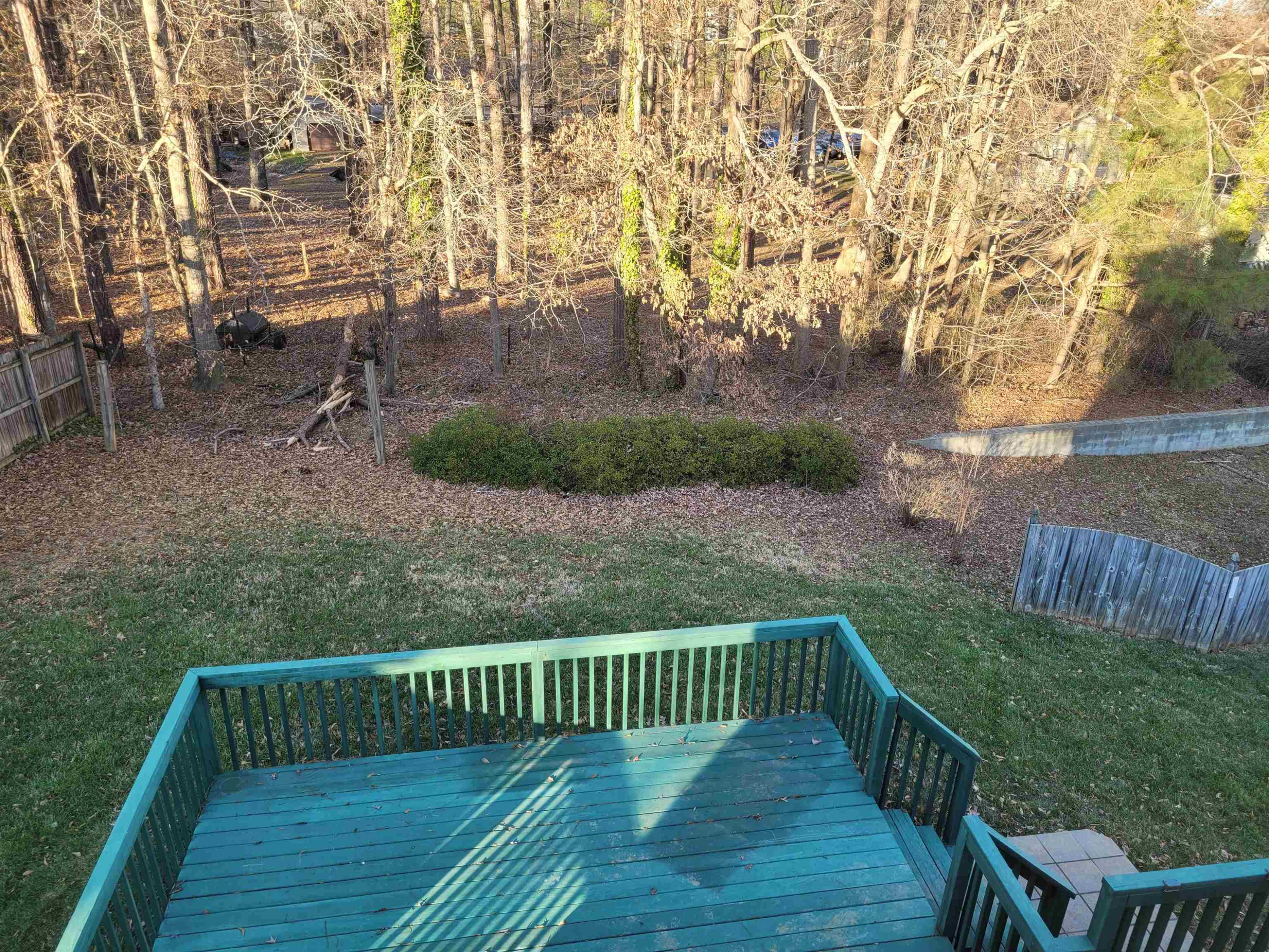 7 Calaveras Court Durham, NC 27713 - Photo 29 of 30 a view of balcony with wooden floor and fence